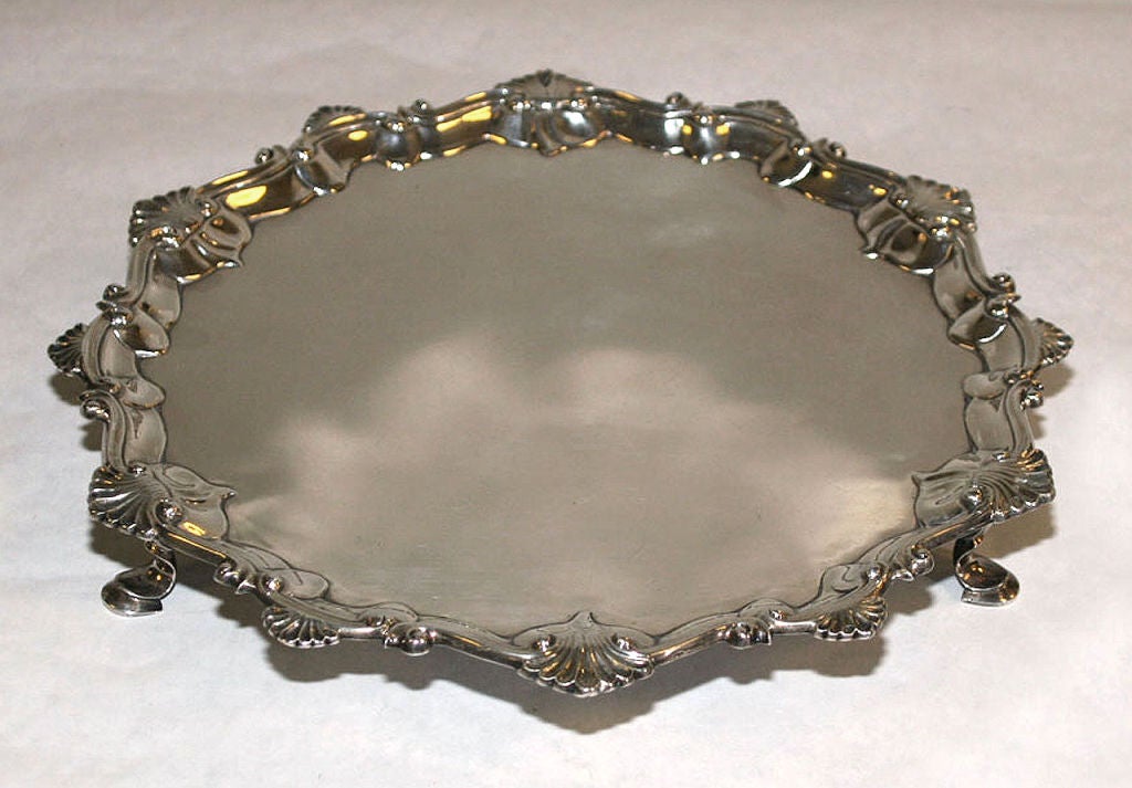 A SALVER BY THOMAS HANNAM & RICHARD MILLS. LONDON, 1764